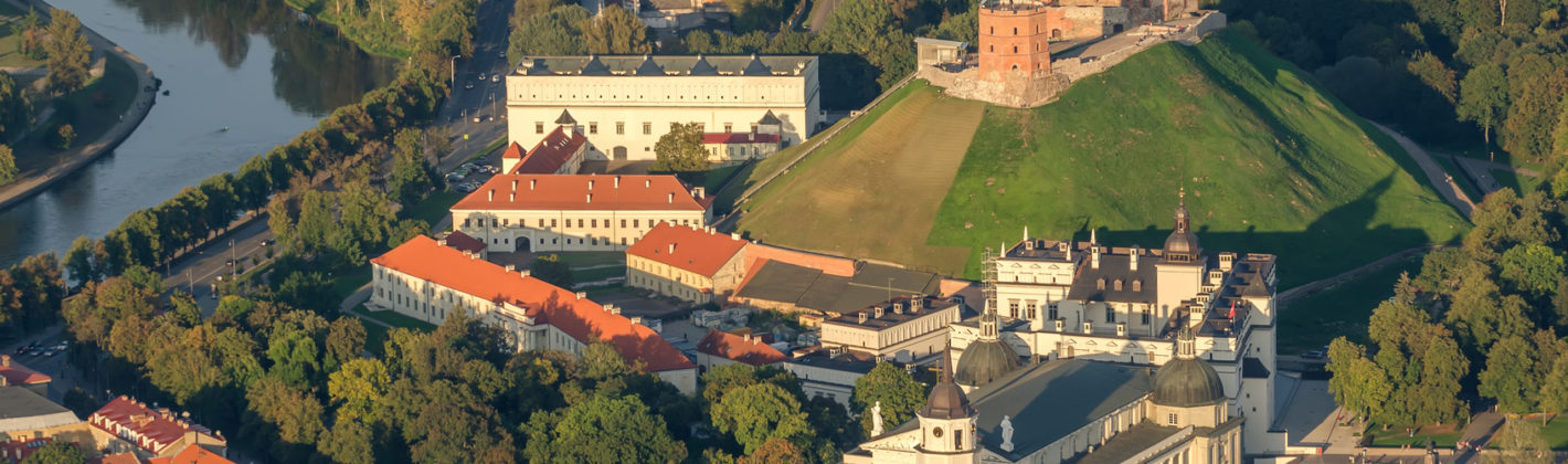 Center part of Vilnius, Lithuania in the sunset. Aerial view from piloted flying object.